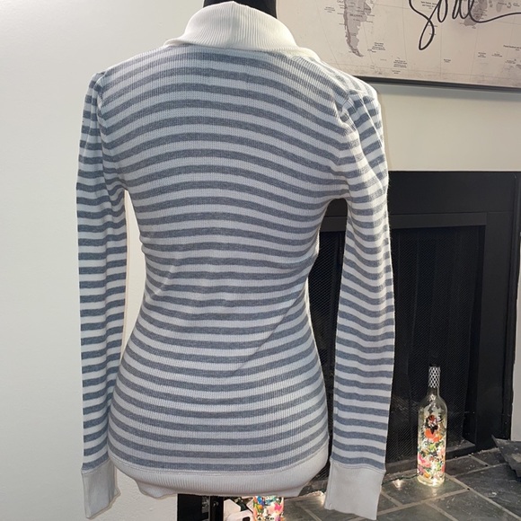 Long sleeve gray and white colored striped shirt. - Picture 10 of 16
